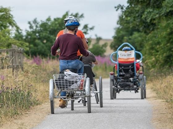 Path showing bikes with trailers and wheelchairs